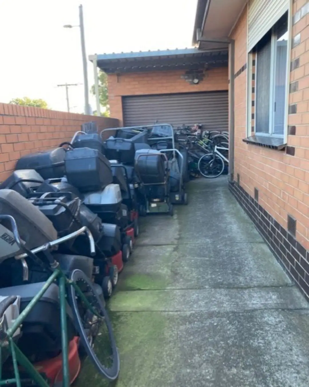 Our Work Hoarding & Deceased Estate Clearance in Campbelltown lawn mower graveyard before