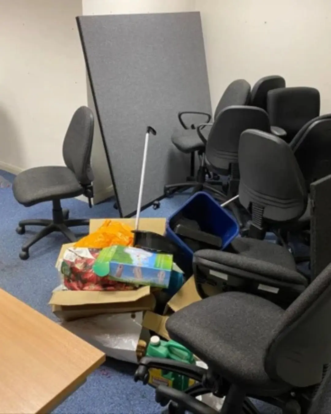 Our Work Office cleanout service with office chairs, boxes, and miscellaneous items prepared for property clearance and disposal.